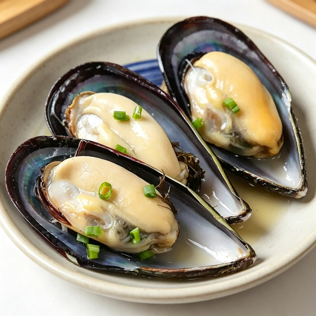 Mussels on the half shell topped with garlic and herbs